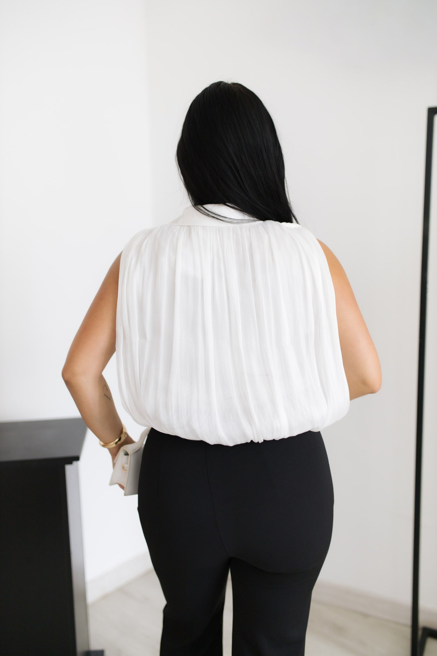 Blusa plissada elegante