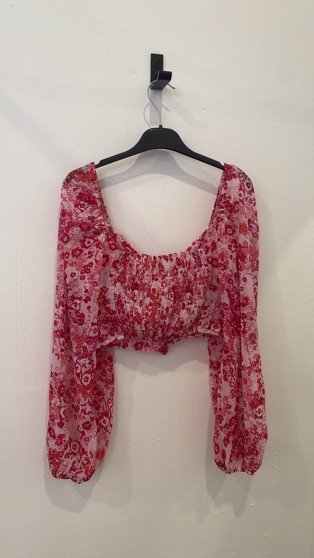 Top estampado rosa