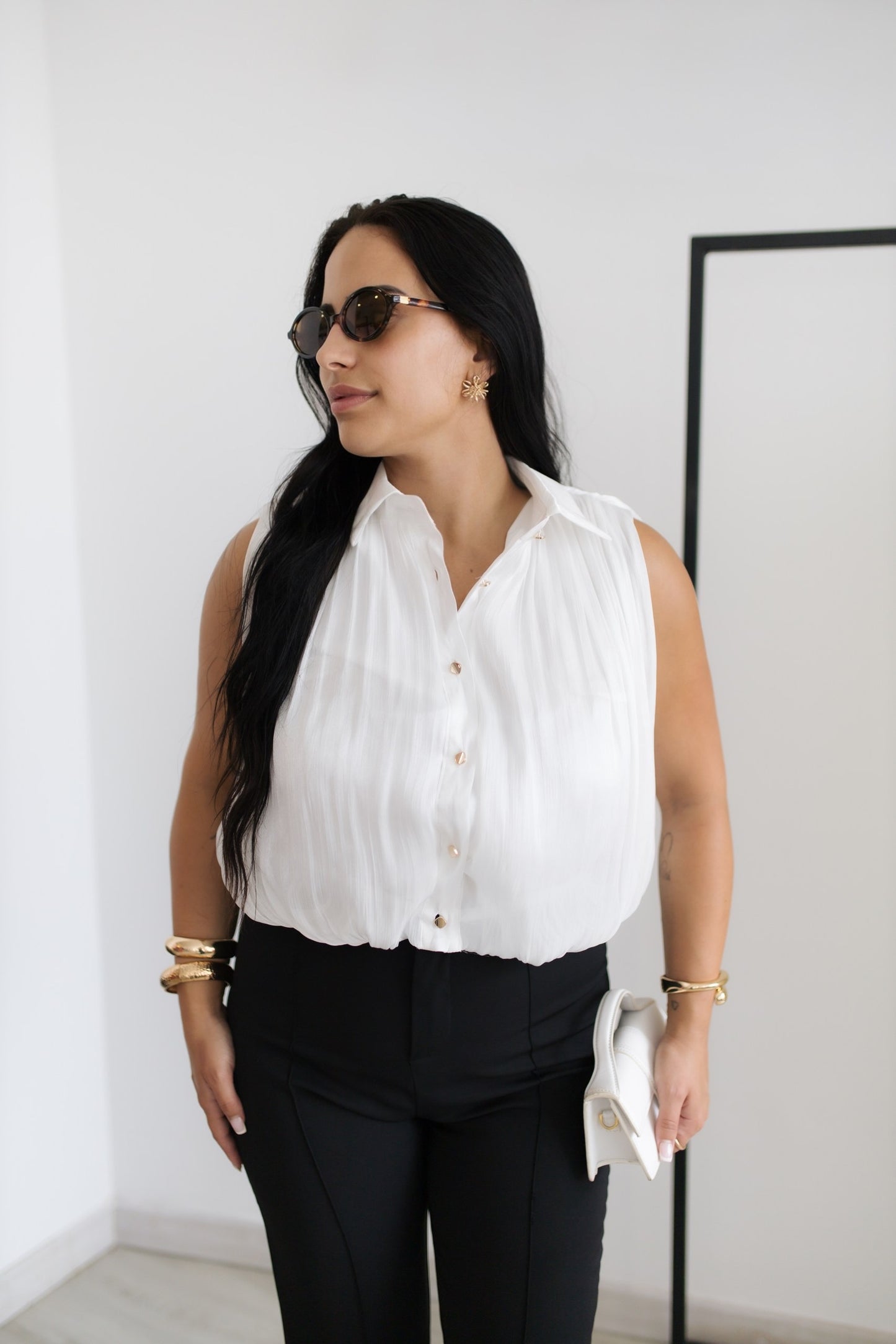 Blusa plissada elegante
