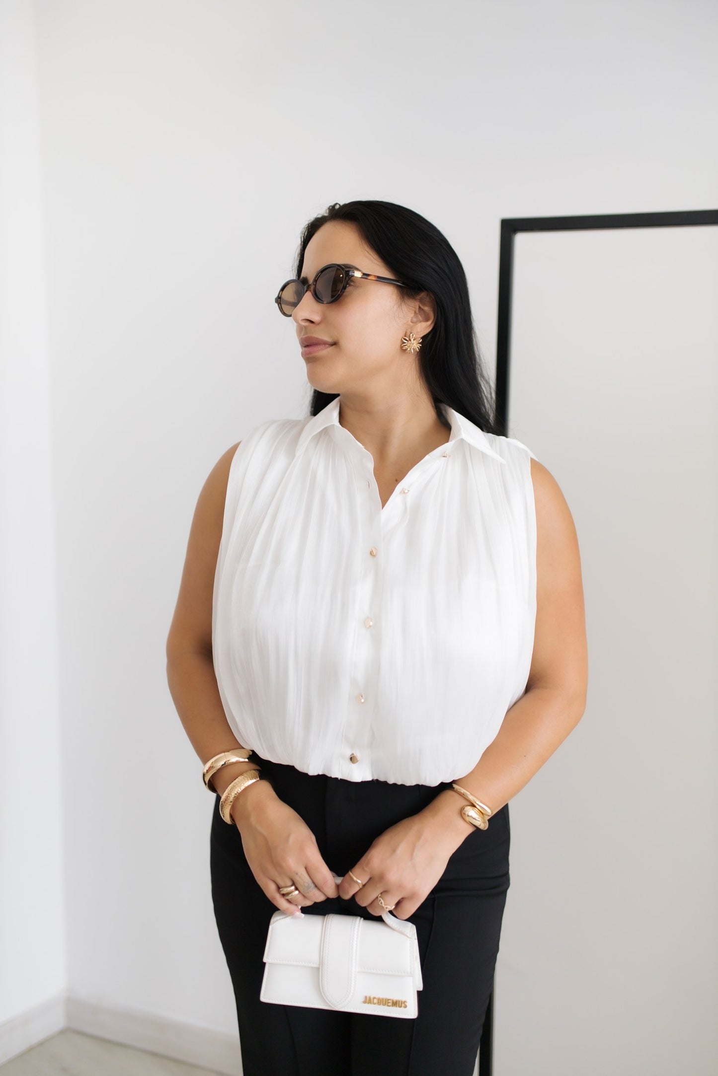 Blusa plissada elegante