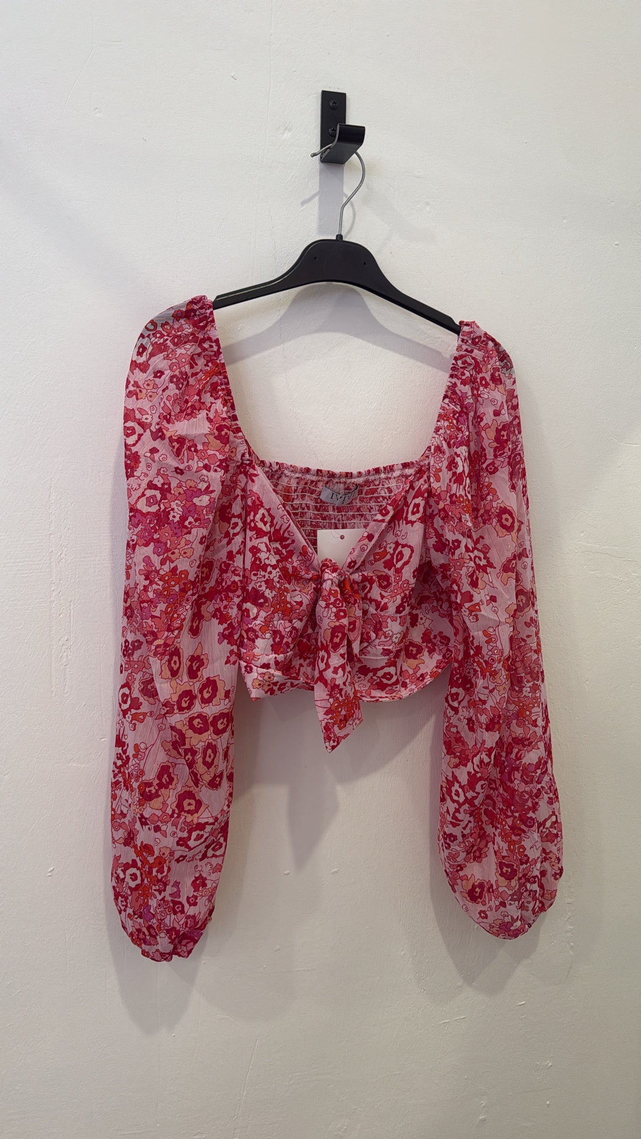 Top estampado rosa