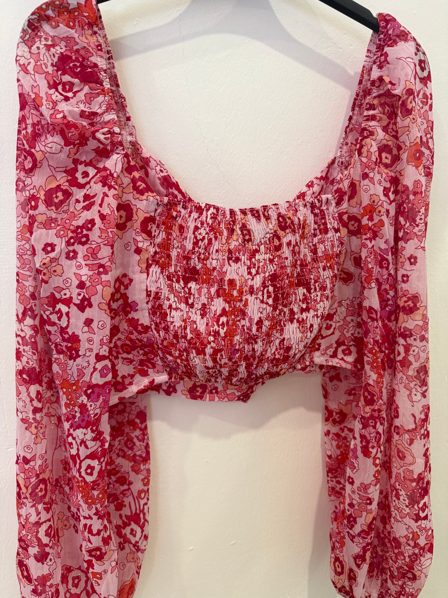 Top estampado rosa